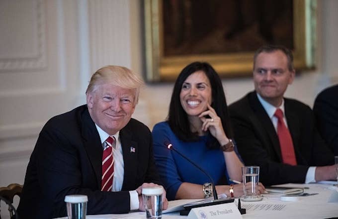 Donald Trump smiles during a roundtable