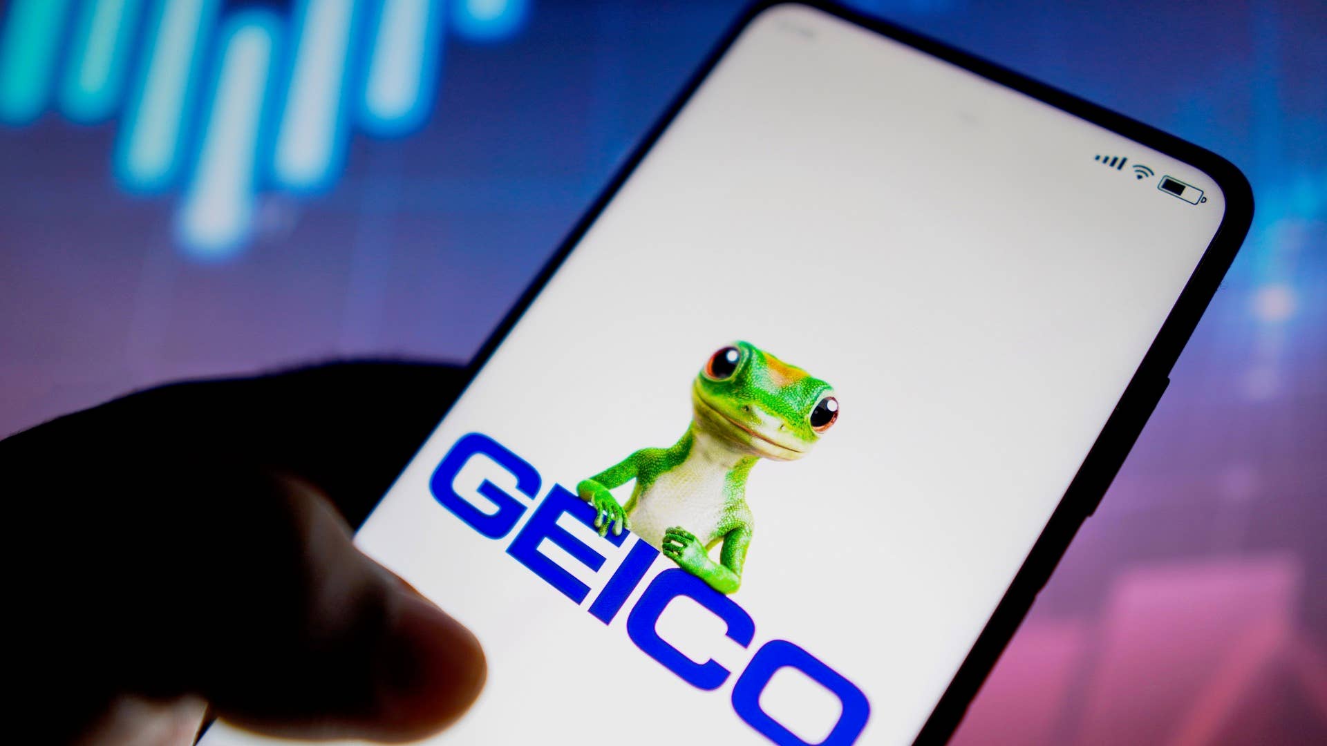 the Government Employees Insurance Company (GEICO) logo seen displayed on a smartphone