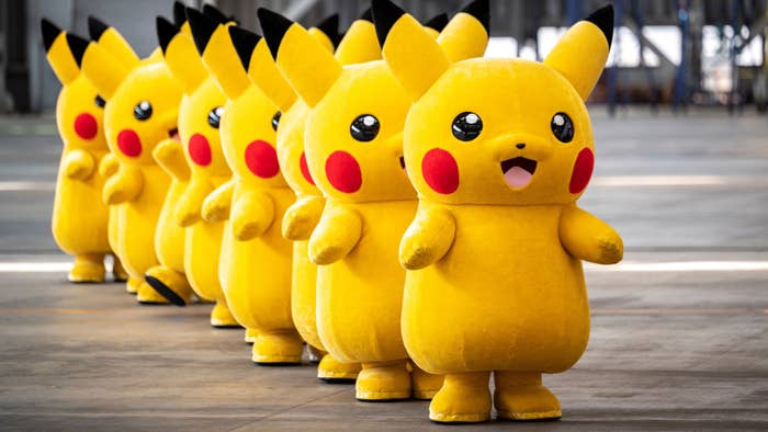 Pikachu mascots are seen during the unveiling of new Pokemon-themed livery on a Skymark Airlines plane.