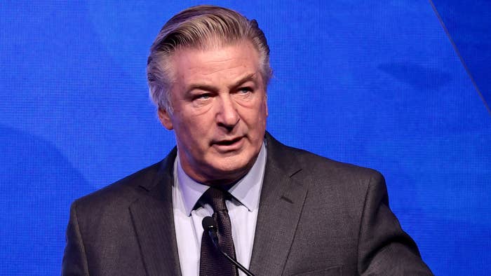 Alec Baldwin is pictured speaking at a podium