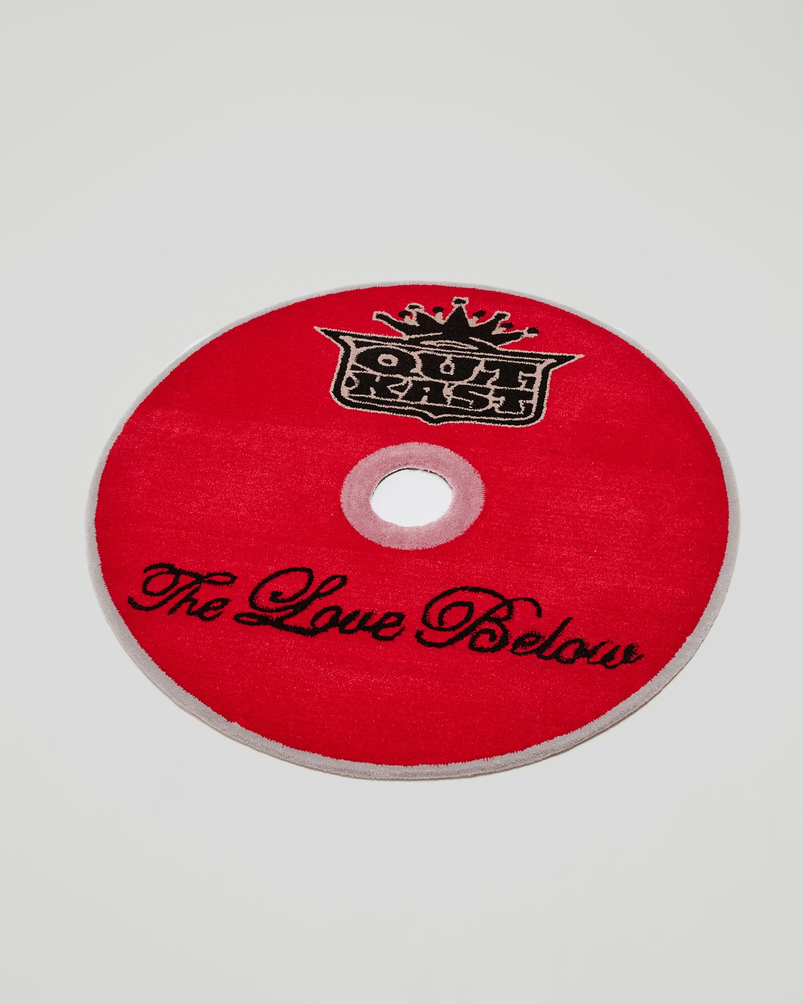 Red round OutKast CD rug