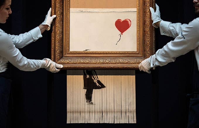 This is a photo of Banksy.