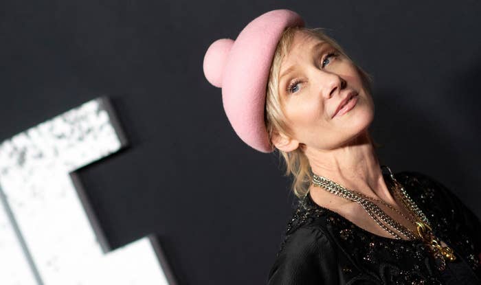 anne heche wearing a pink hat