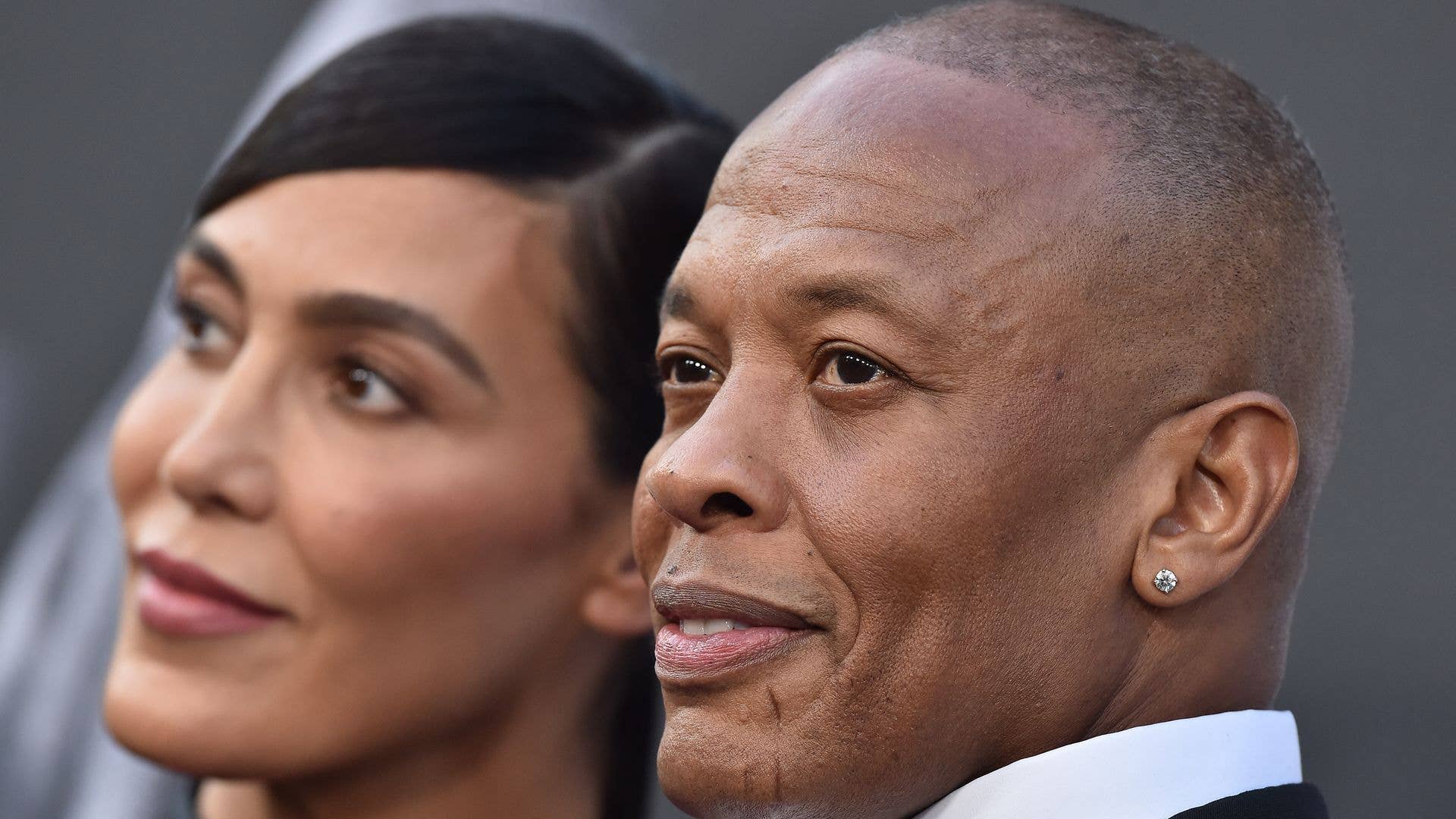 Dr. Dre with Nicole Young at 'The Defiant Ones' premiere