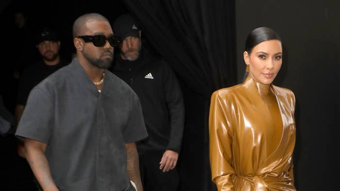 Kim Kardashian and Kanye West attend the Balenciaga show