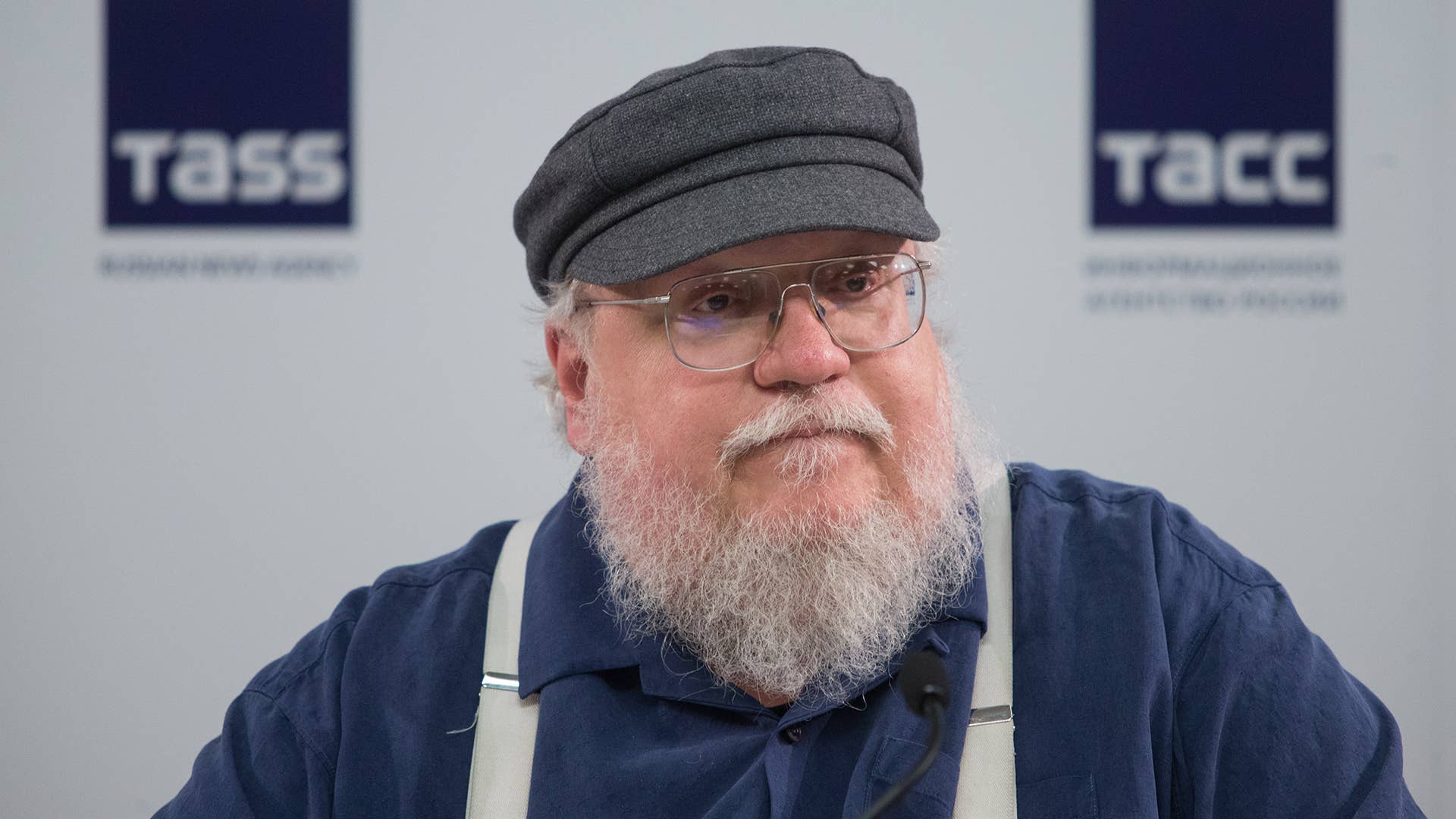 George R.R. Martin attending a 2017 press conference in Russia.
