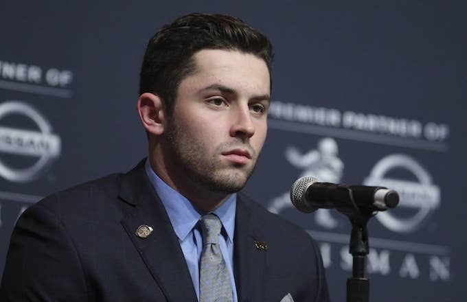 Baker Mayfield speaks with reporters at Heisman Trophy ceremony.