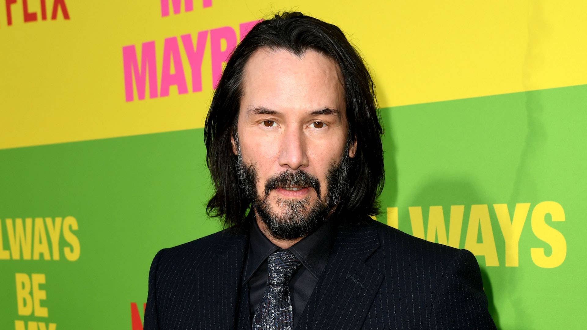 Keanu Reeves arrives at the premiere of Netflix's "Always Be My Maybe."