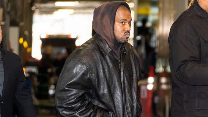 Ye is seen walking outdoors