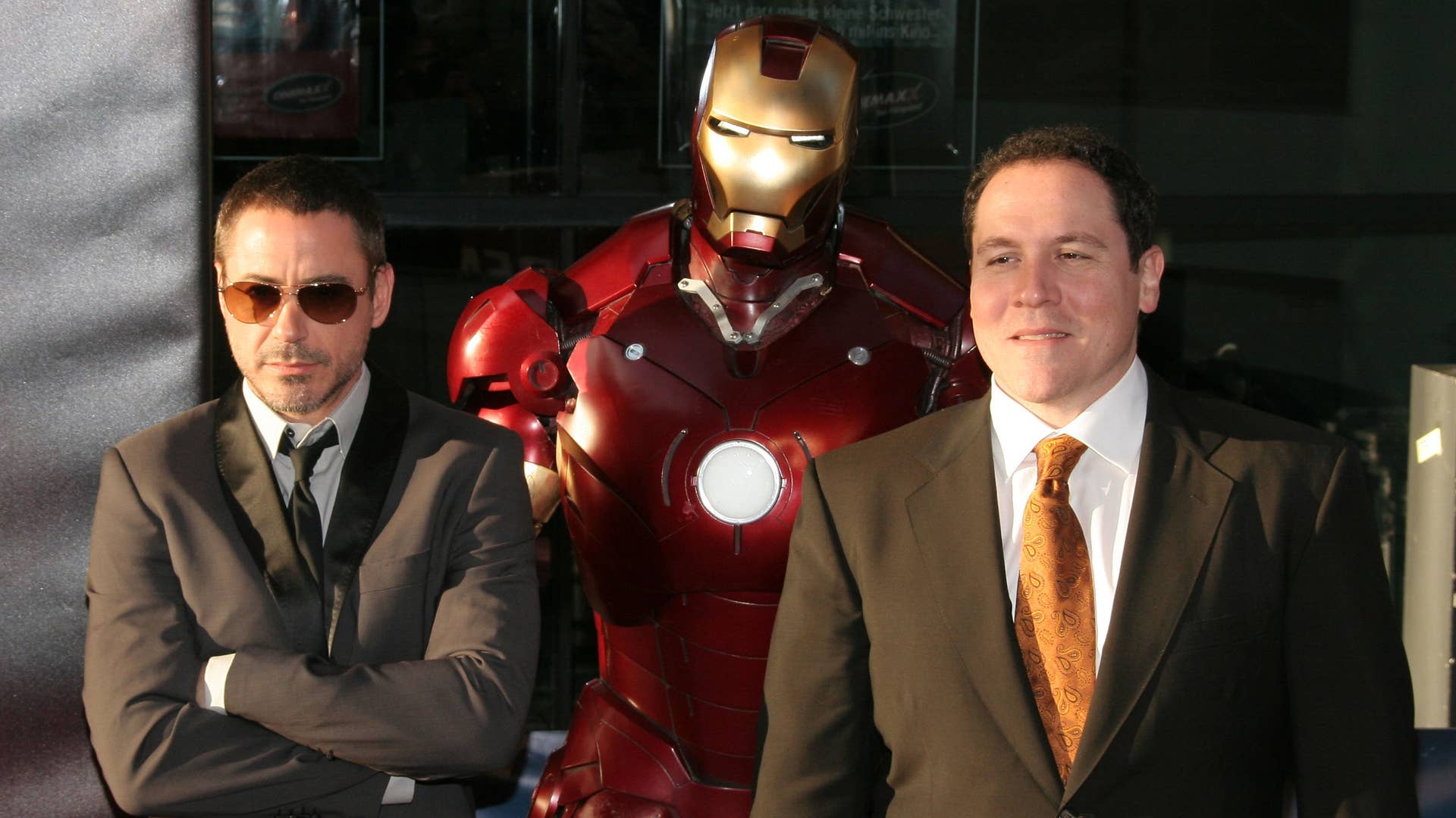 Robert Downey Jr. and Jon Favreau attend 'Iron Man' premiere.