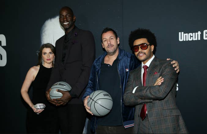 Julia Fox, Kevin Garnett, Adam Sandler and The Weeknd attend the premiere of A24's "Uncut Gems"
