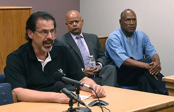 O.J. Simpson listens during the testimony of Bruce Fromong during his parole hearing