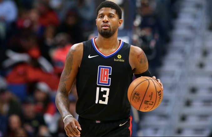 Paul George #13 of the LA Clippers reacts during a game
