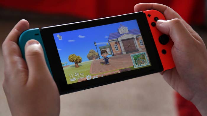Someone playing &#x27;Animal Crossing: New Horizons&#x27; on Switch