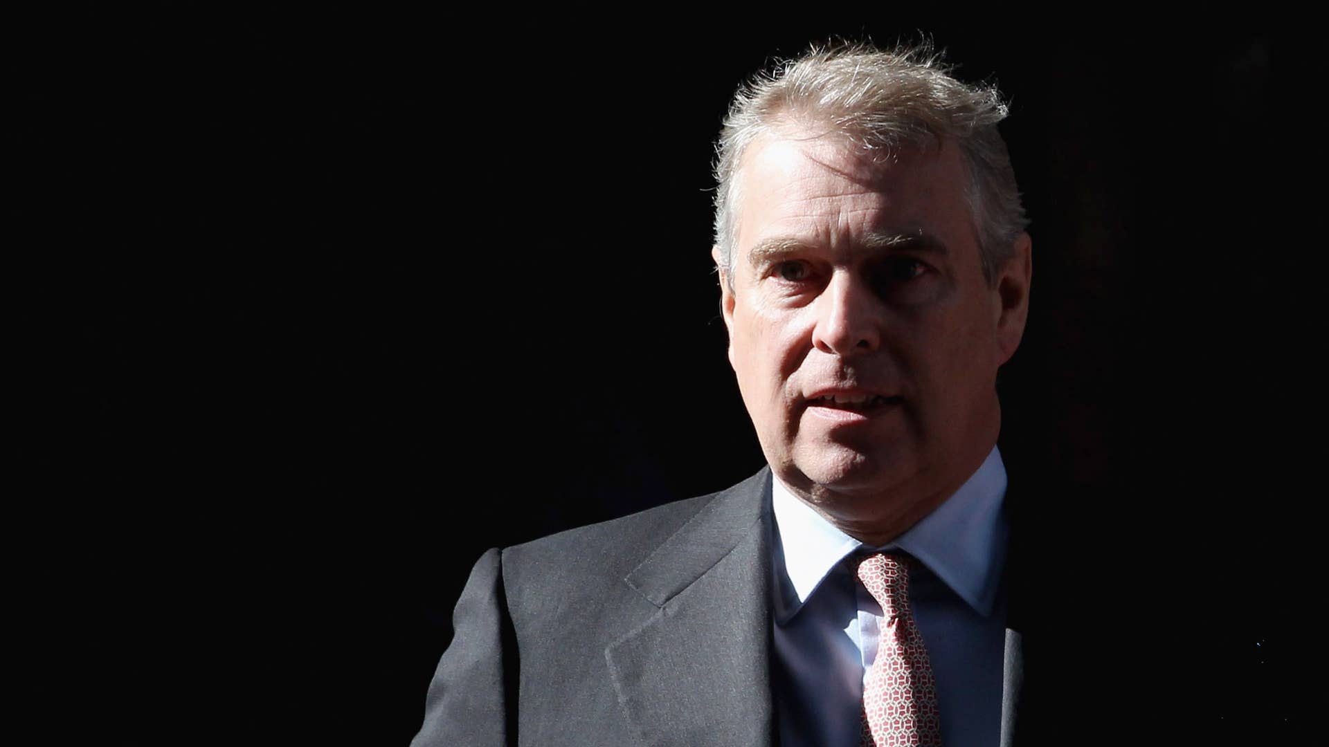 Prince Andrew, Duke of York leaves the headquarters of Crossrail at Canary Wharf.