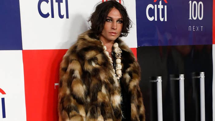 Ezra Miller is pictured at a red carpet event
