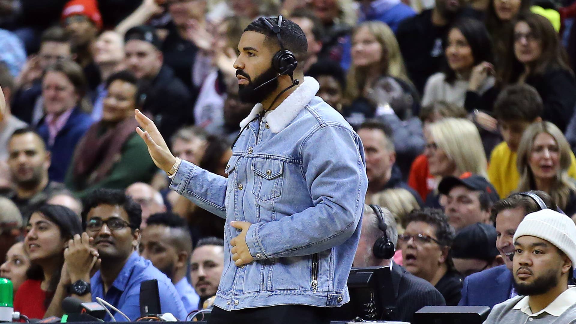 Drake dances during the first half of an NBA game between the Suns and Raptors.