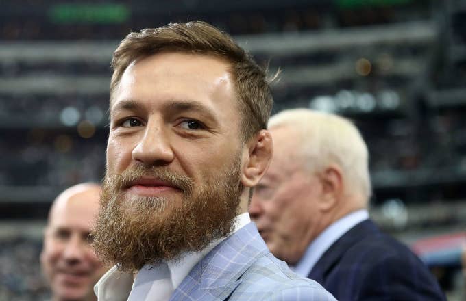 Conor McGregor is seen on the sidelines before the NFL game