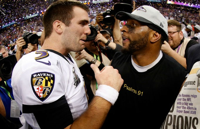 Joe Flacco and Ray Lewis exchange words after winning the Super Bowl.