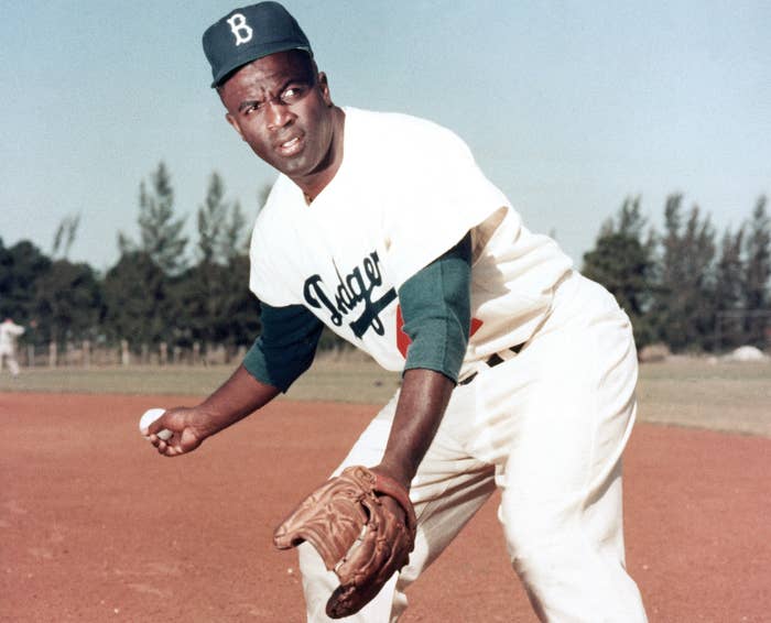 Jackie Robinson photographed with glove