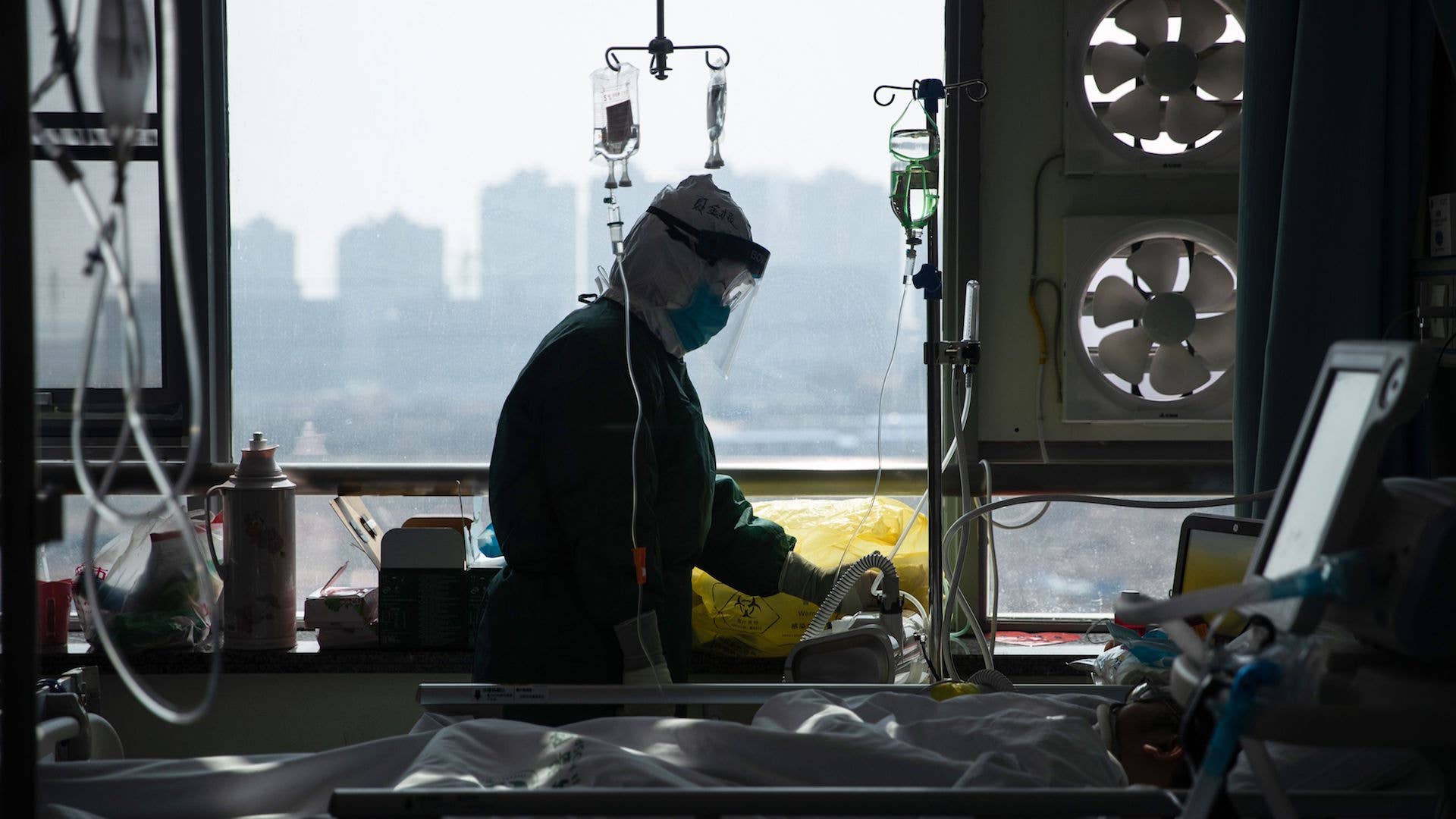 Photo taken on February 22, 2020 of medical staff member treating coronavirus patient.