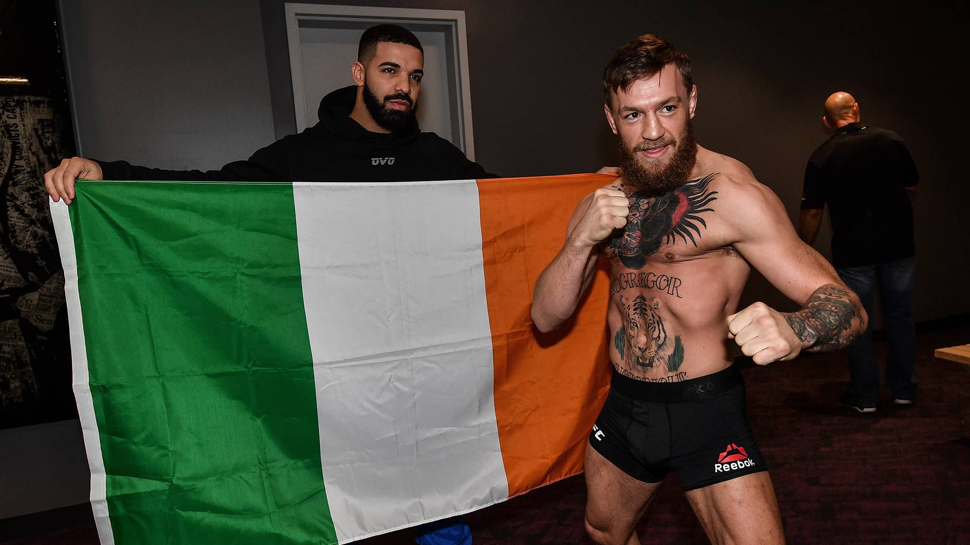 Rapper Drake and Conor McGregor pose for a photo backstage during the UFC 229 weigh-in