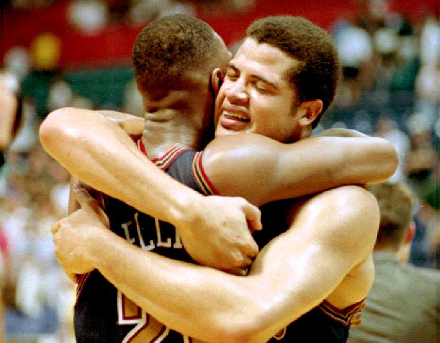 This is a photo of two Denver teammates hugging after beating the Supersonics in 1994.