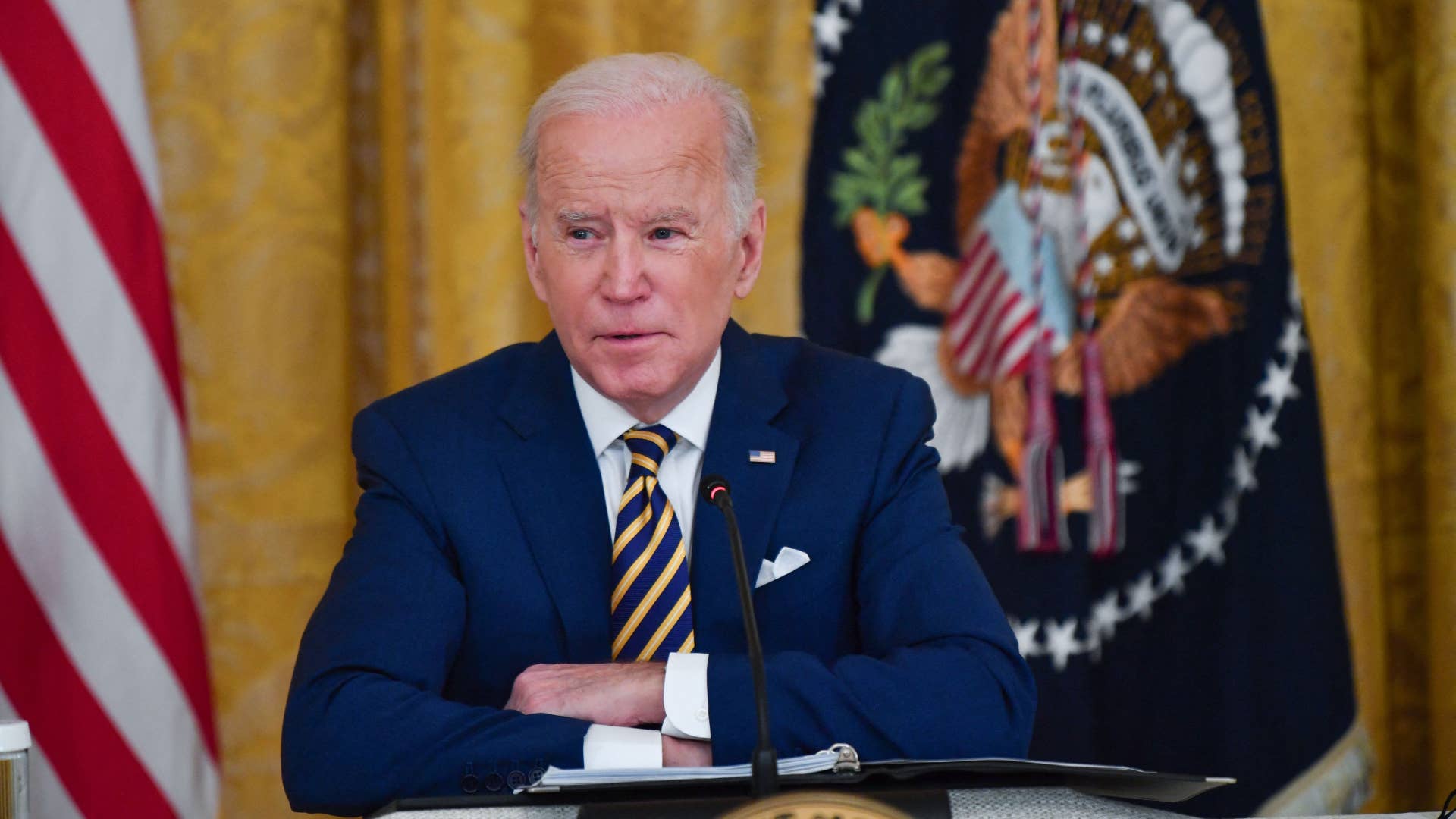 Joe Biden is pictured wearing a suit