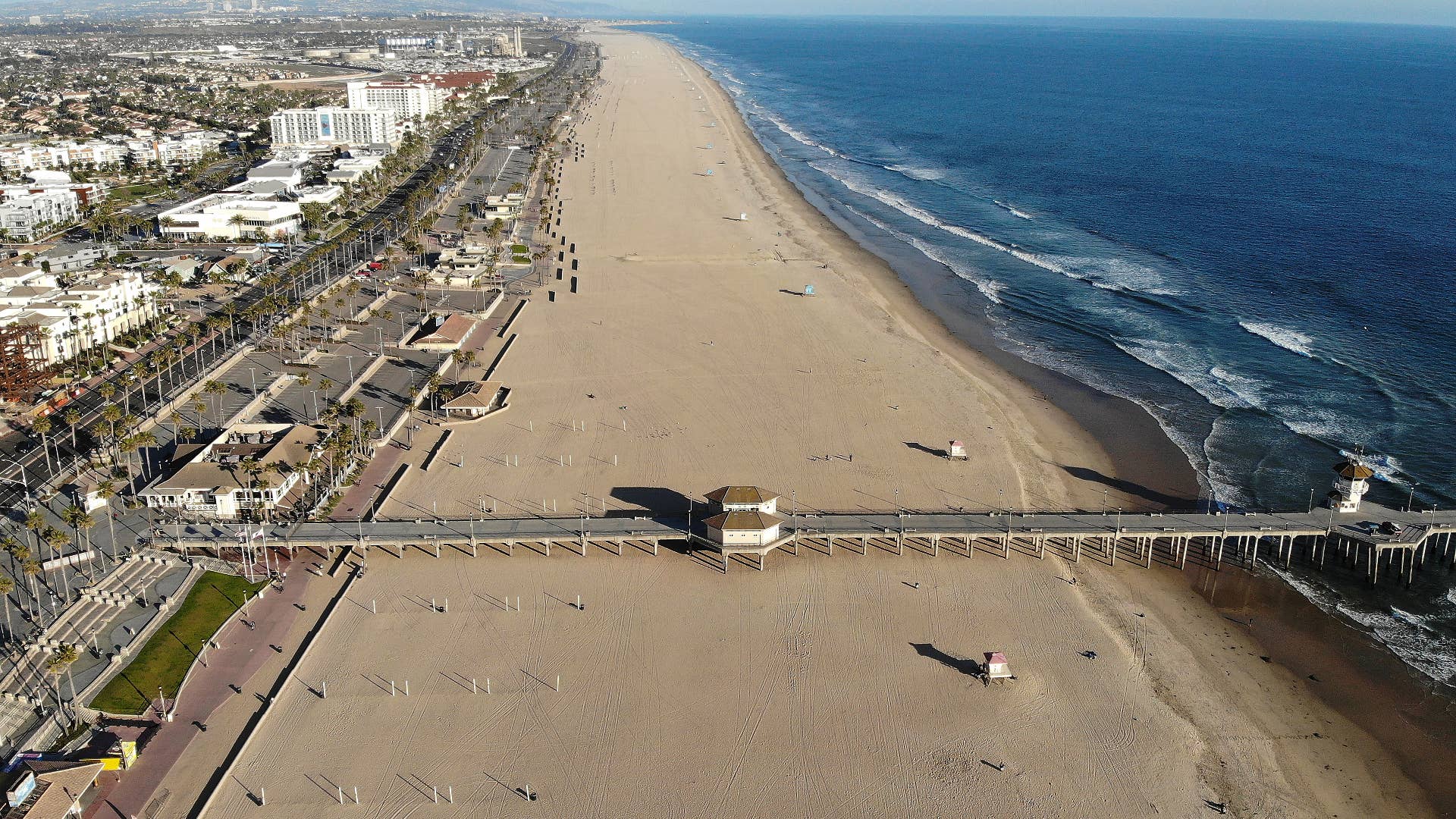 An aerial view of Huntington Beach and its shuttered pier amid the coronavirus pandemic.
