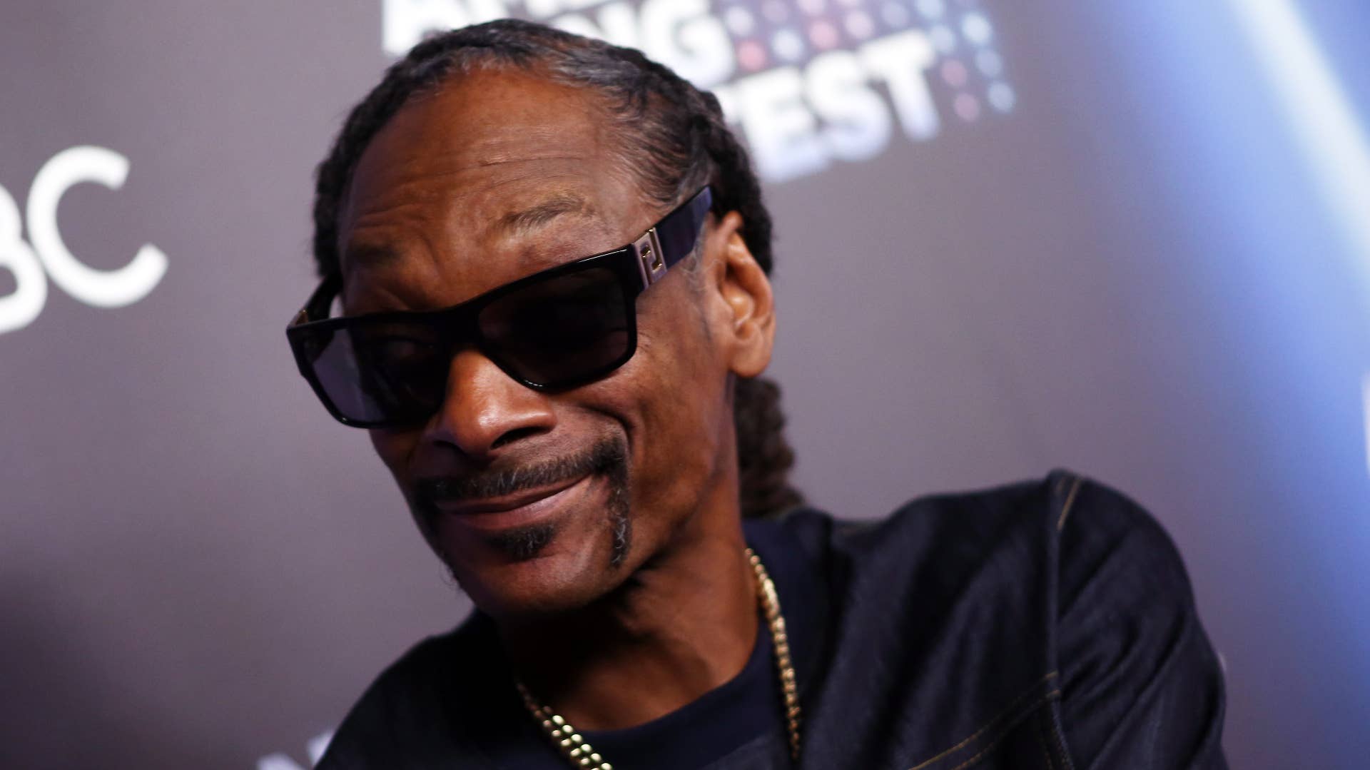Snoop Dogg photographed on red carpet.
