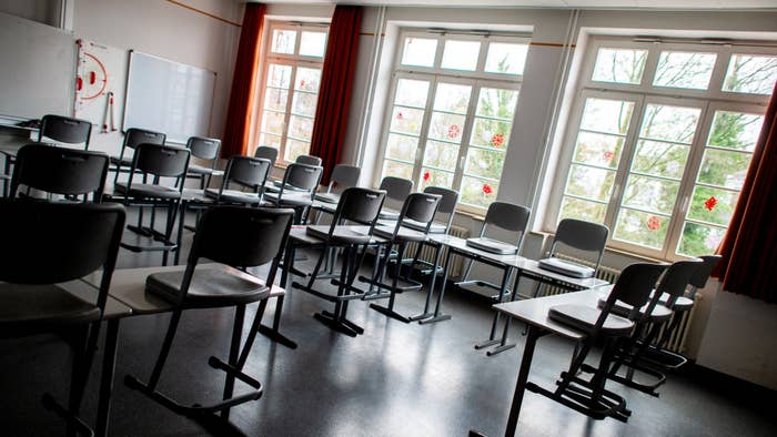Lower Saxony, Oldenburg: Chairs and desks stand in the classroom of a school.