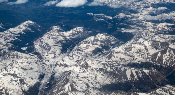 An aerial shot of the Rocky Mountains in May 2022