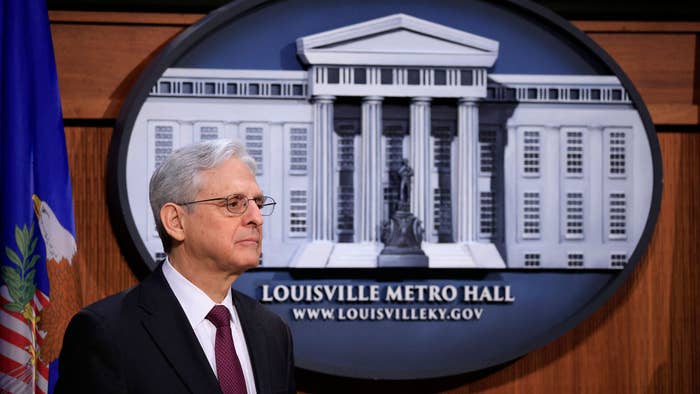 US Attorney General Merrick Garland listens during a press conference on the the civil rights investigation into Louisville Metro PD
