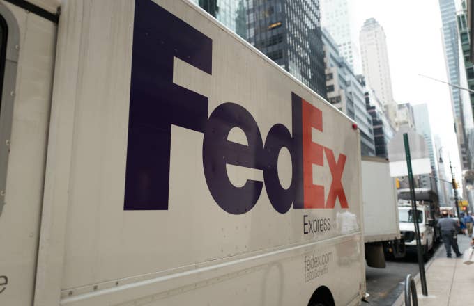 Federal Express (FedEx) truck with logo parked on Madison Avenue