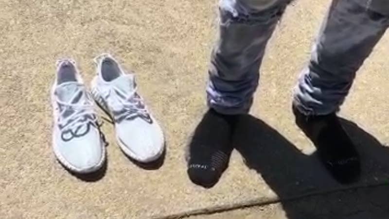 Kanye West Would Rather Go Shoeless Than Get His White Yeezys Dirty