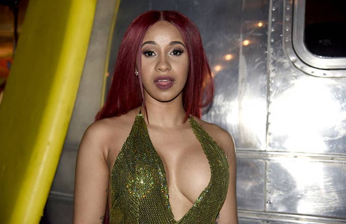 Cardi B poses at the Make Trap Great Again showcase