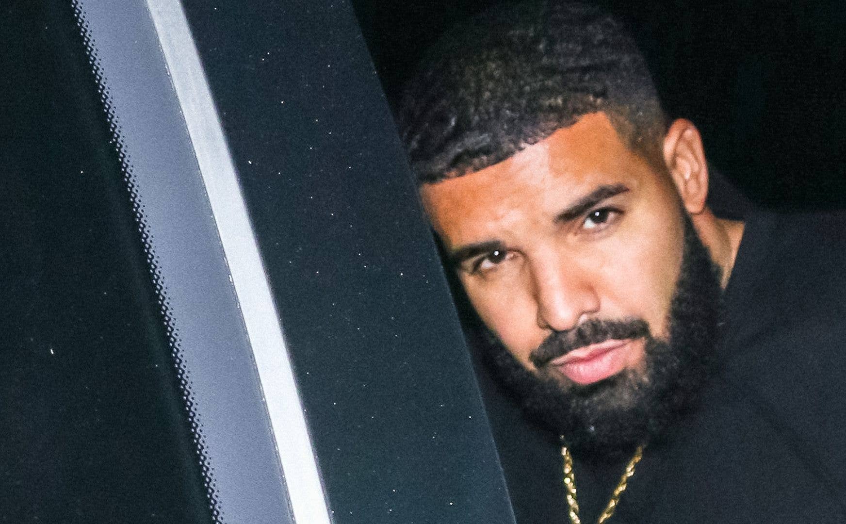 Drake pictured in a car in 2019
