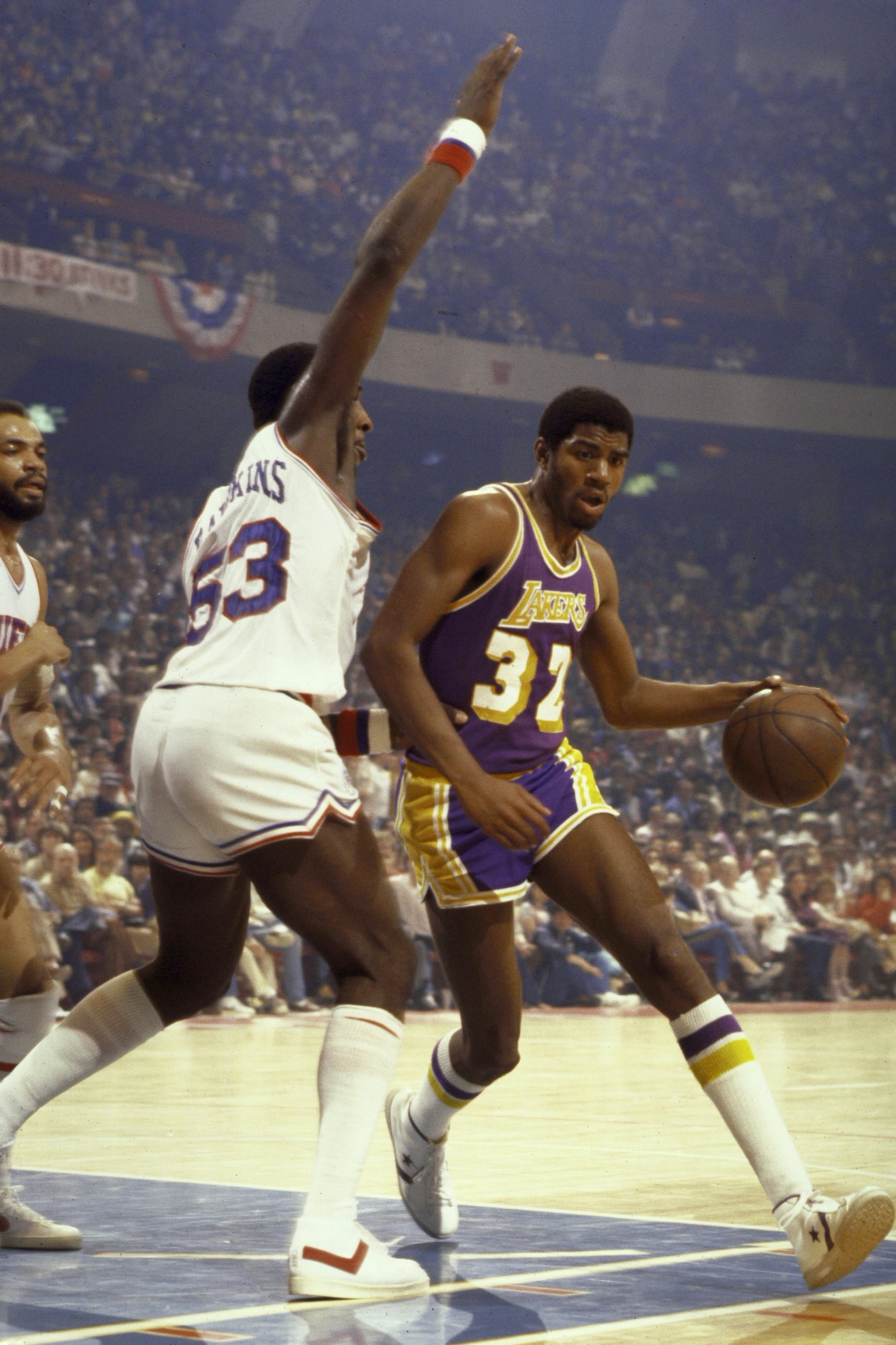 This is a photo of Magic Johnson in his 1980 season with the Lakers.