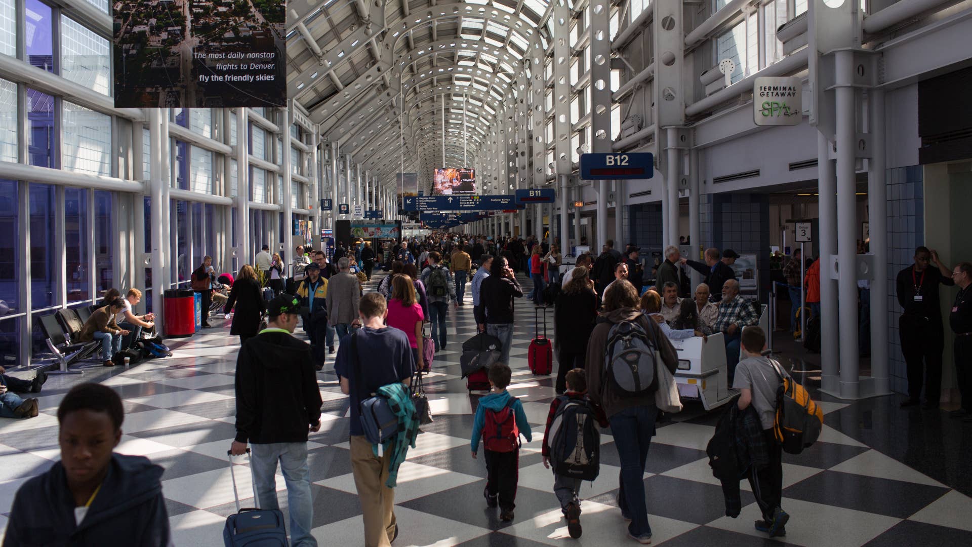 Traveling passengers walk to their flights at Chicago's O'Hare International Airport.