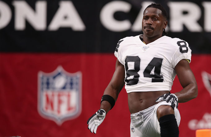 Antonio Brown stretches prior to a preseason game against Arizona.