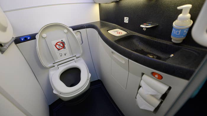 Photograph of the inside of a plane bathroom