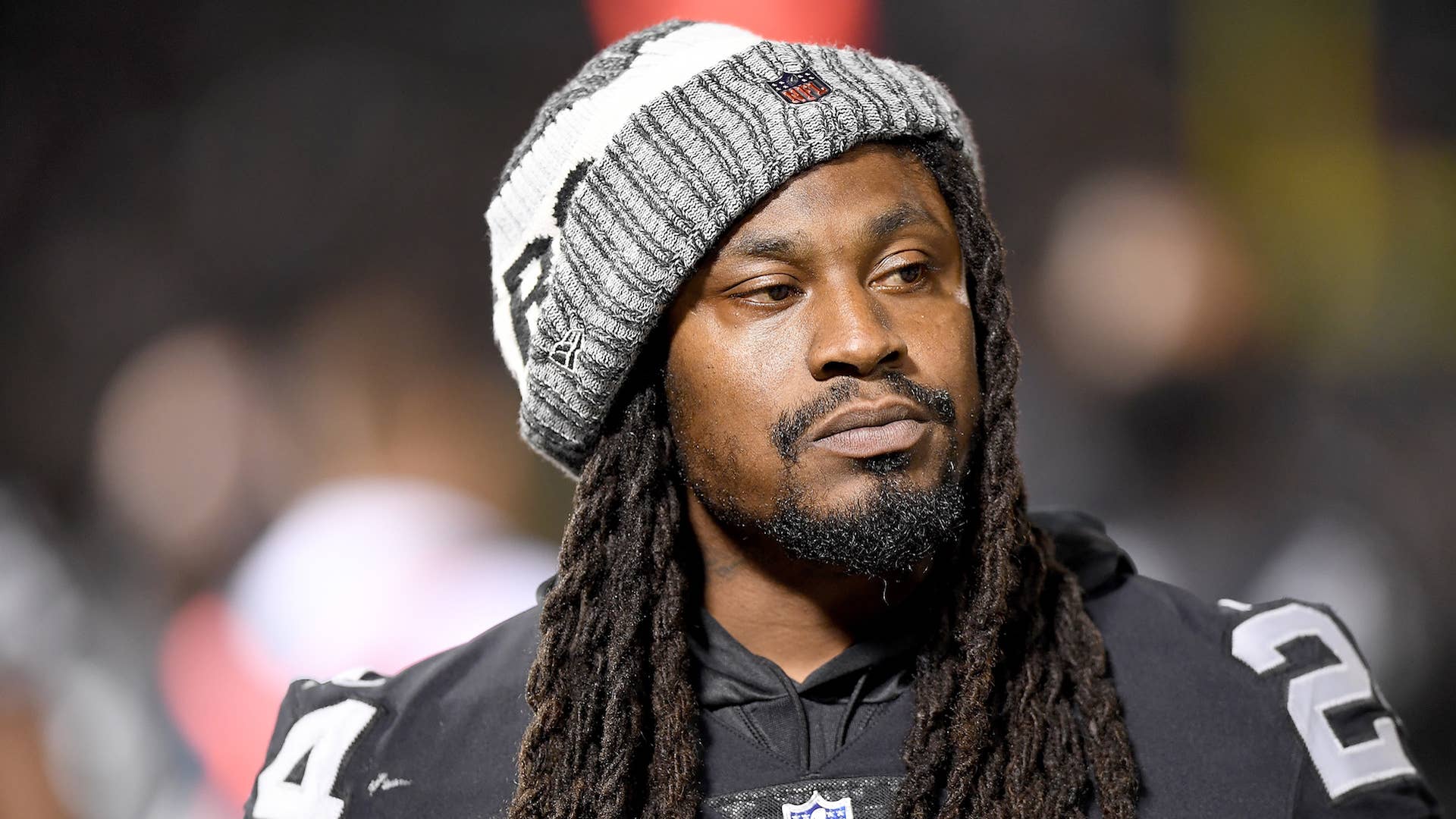 Marshawn Lynch looks on from the sidelines against the Detroit Lions.
