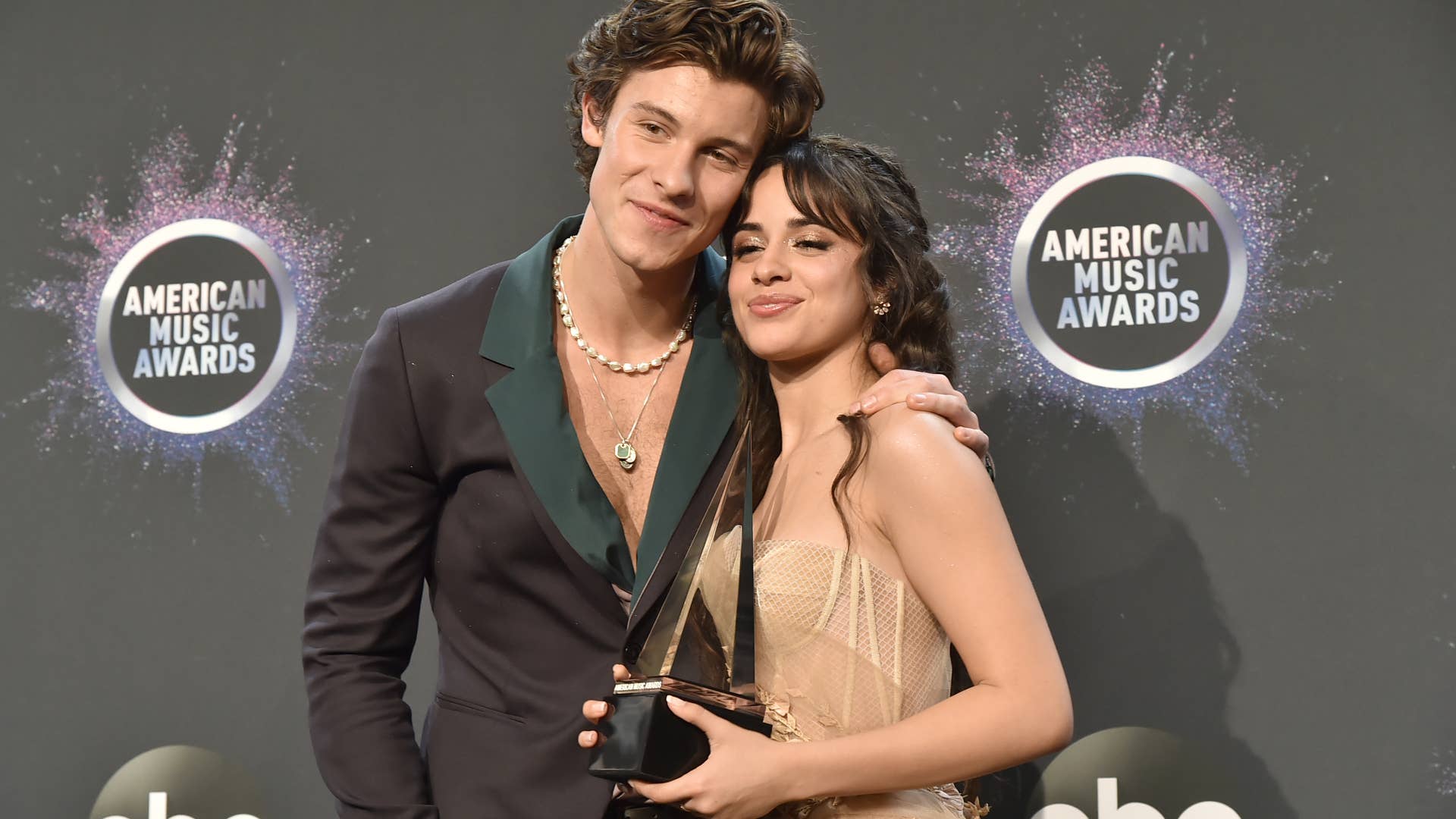 Shawn Mendes and Camila Cabello pose for photo together.