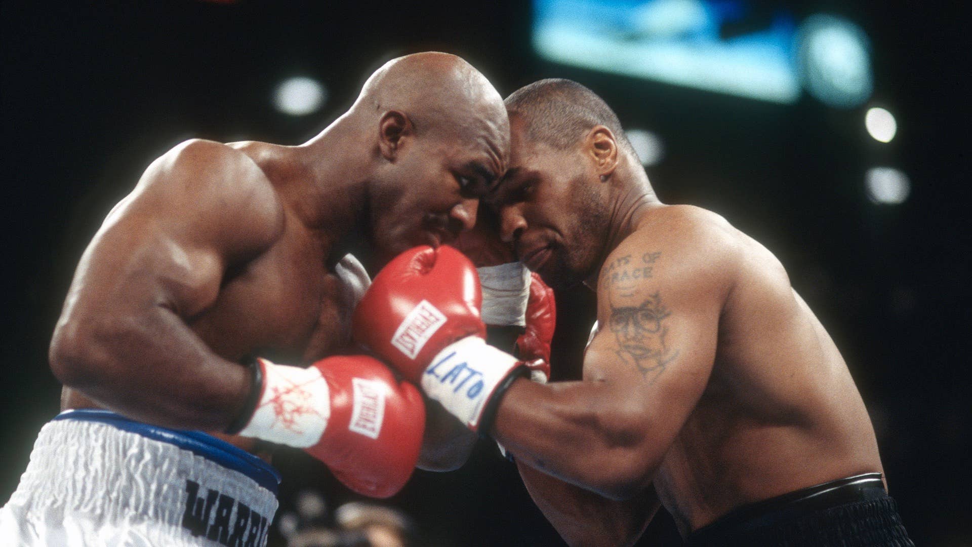 Evander Holyfield and Mike Tyson fight for WBA World Heavyweight Title on June 28,1997