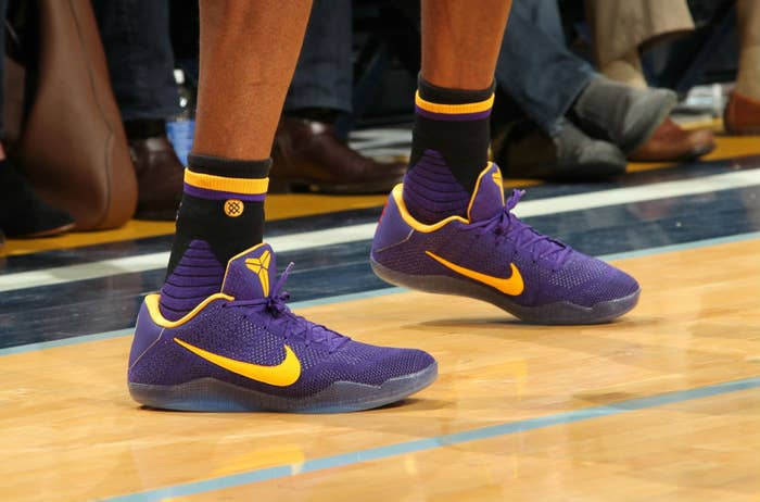 Kobe Bryant Wearing Purple/Yellow Nike Kobe 11 PE