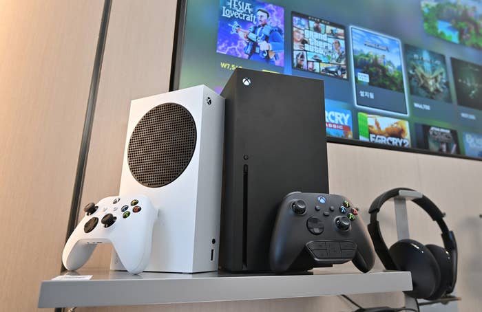 Microsoft&#x27;s Xbox Series X (black) and series S (white) gaming consoles