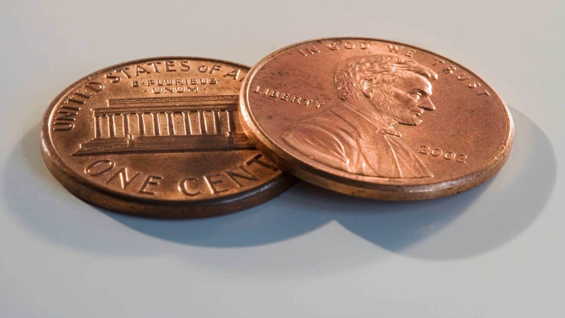 A stock photo of two pennies close up.