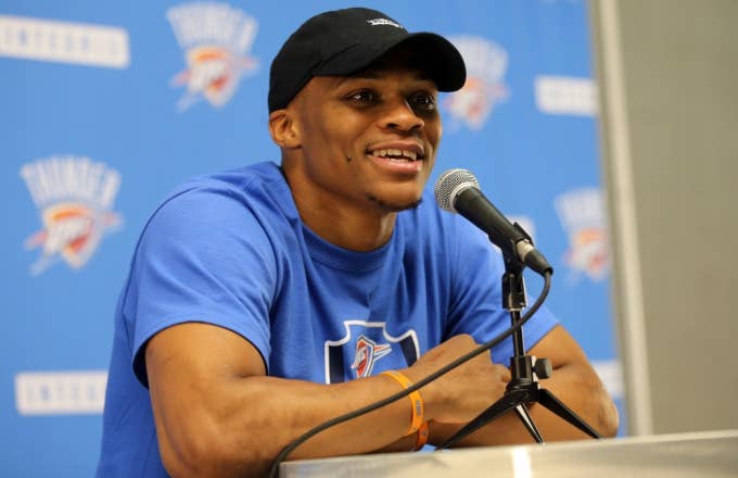 Russell Westbrook speaks at a press conference.