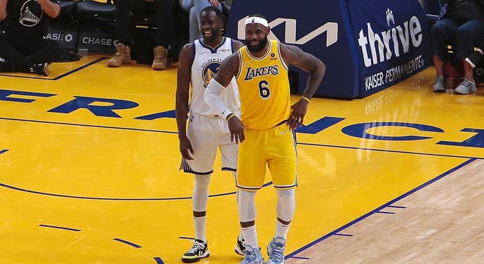 LeBron James #6 of the Los Angeles Lakers and Draymond Green #23 of the Golden State Warriors.