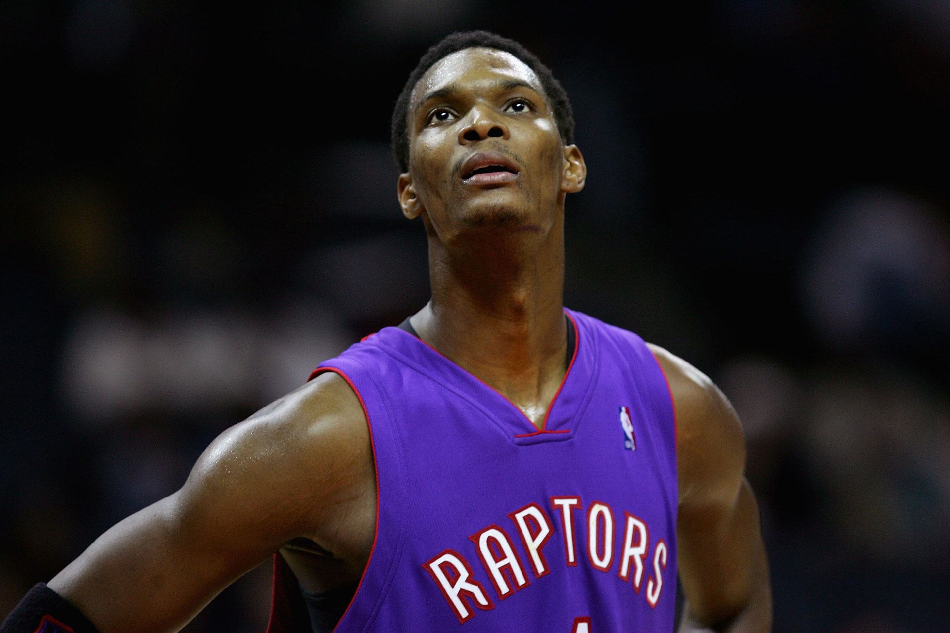 Chris Bosh #4 of the Toronto Raptors looks up during the game against the Charlotte Bobcats